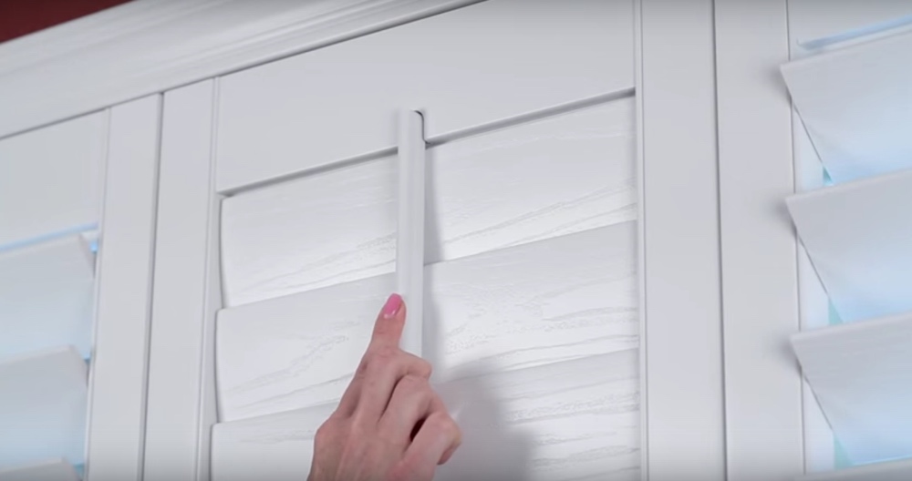 Pushing The Tilt Rod Into The Mousehole Of Your Energy Efficient Shutters